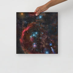 An Orion Constellation poster on a plain backdrop in size 16x16”.