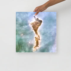 A Finger of God (Carina Nebula) poster on a plain backdrop in size 16x16”.
