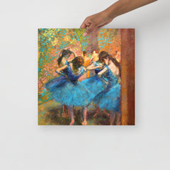 A Dancers in Blue by Edgar Degas poster on a plain backdrop in size 16x16”.
