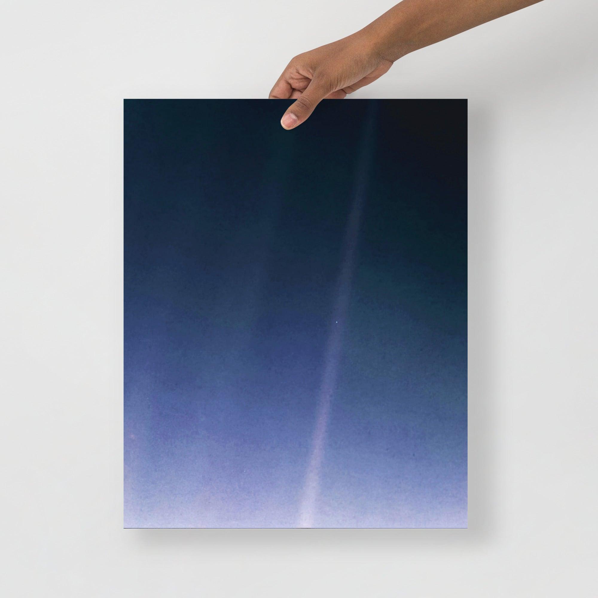 A Pale Blue Dot poster on a plain backdrop in size 16x20”.