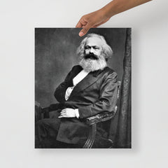 A Karl Marx poster on a plain backdrop in size 16x20”.