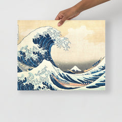 The Great Wave off Kanagawa by Hokusai poster on a plain backdrop in size 16x20”.