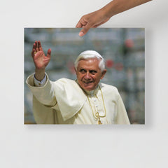 A Pope Benedict XVI poster on a plain backdrop in size 16x20”.