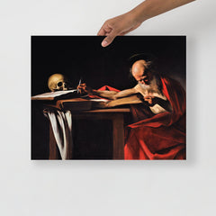A Saint Jerome Writing by Caravaggio poster on a plain backdrop in size 16x20”.