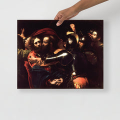 The Taking of Christ by Caravaggio poster on a plain backdrop in size 16x20”.