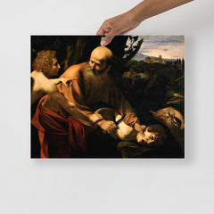 A Sacrifice of Isaac by Caravaggio poster on a plain backdrop in size 16x20”.