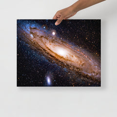 An Andromeda Galaxy poster on a plain backdrop in size 16x20”.
