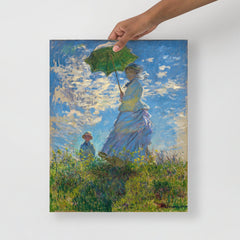 A Madame Monet and Her Son by Claude Monet poster on a plain backdrop in size 16x20”.