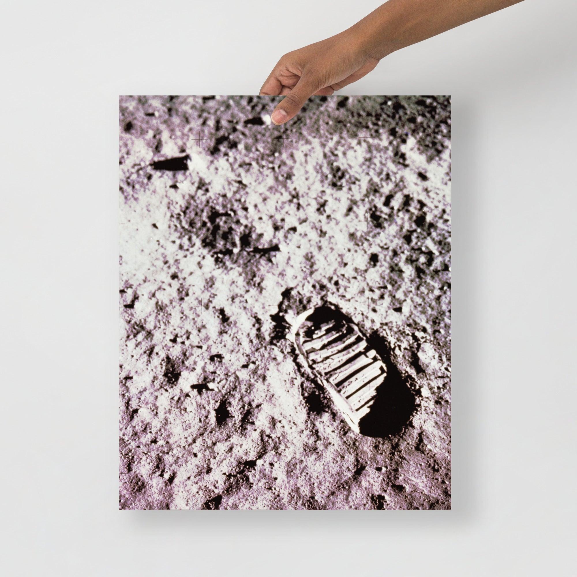A Footprint on the Moon Apollo 11 poster on a plain backdrop in size 16x20”.