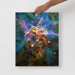 A Mystic Mountain (Carina Nebula) poster on a plain backdrop in size 16x20”.