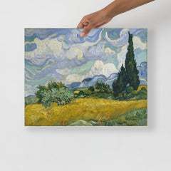 A Wheat Field with Cypresses by Vincent van Gogh poster on a plain backdrop in size 16x20”.