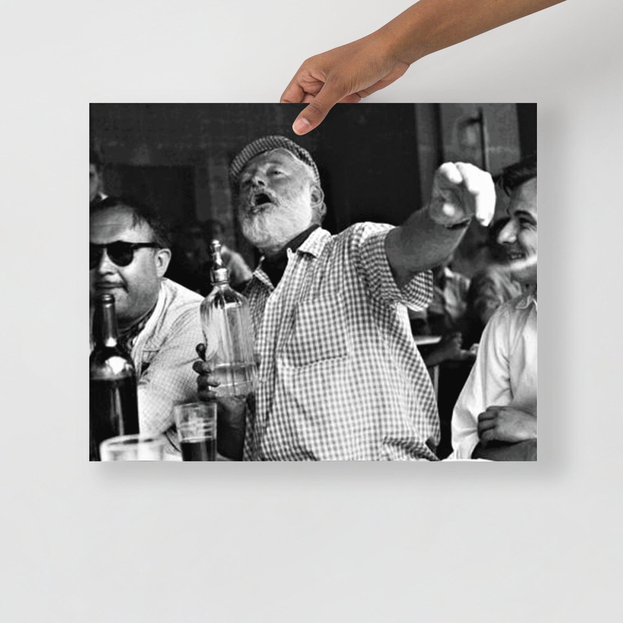 An Ernest Hemingway at a Bar poster on a plain backdrop in size 16x20”.