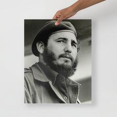 A Fidel Castro poster on a plain backdrop in size 16x20”.