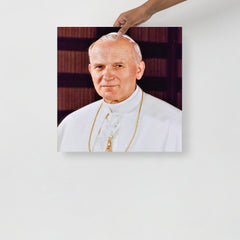 A Pope John Paul II poster on a plain backdrop in size 18x18”.