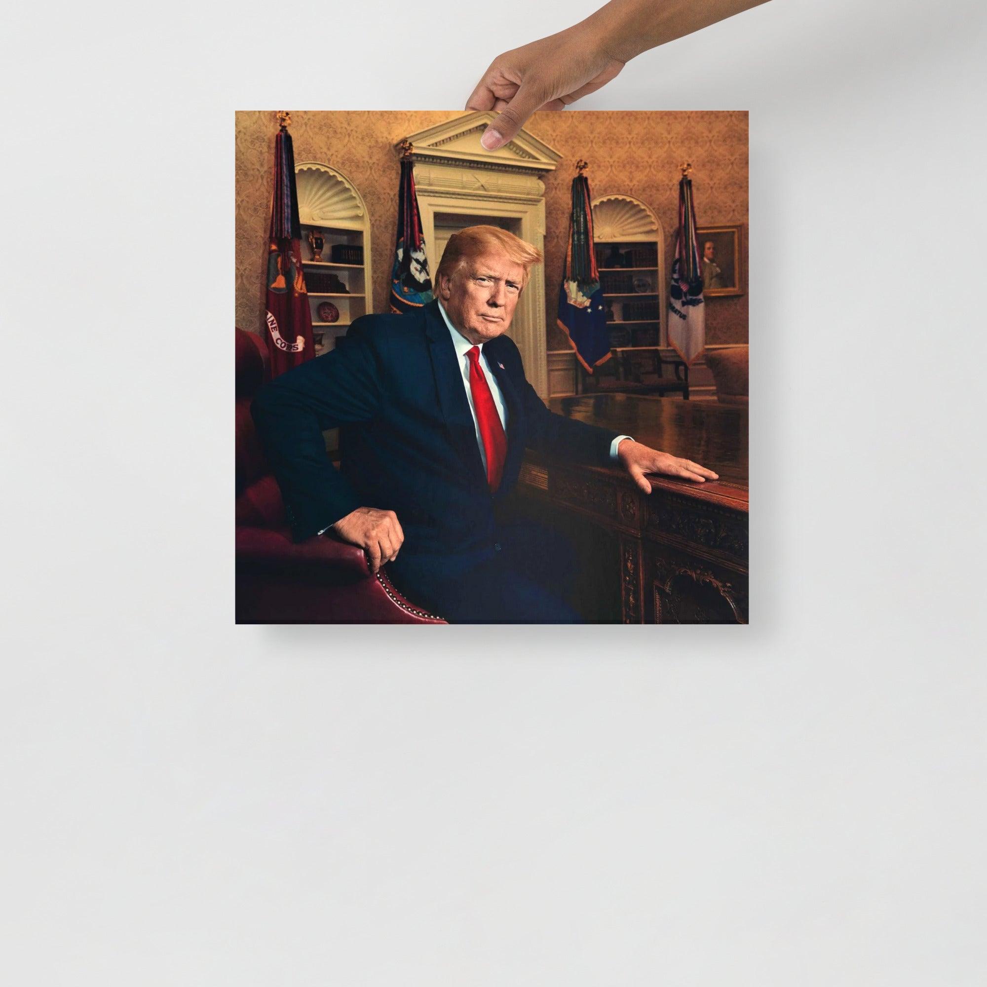 A Donald Trump at the Oval Office poster on a plain backdrop in size 18x18”.