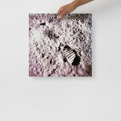 A Footprint on the Moon Apollo 11 poster on a plain backdrop in size 18x18”.