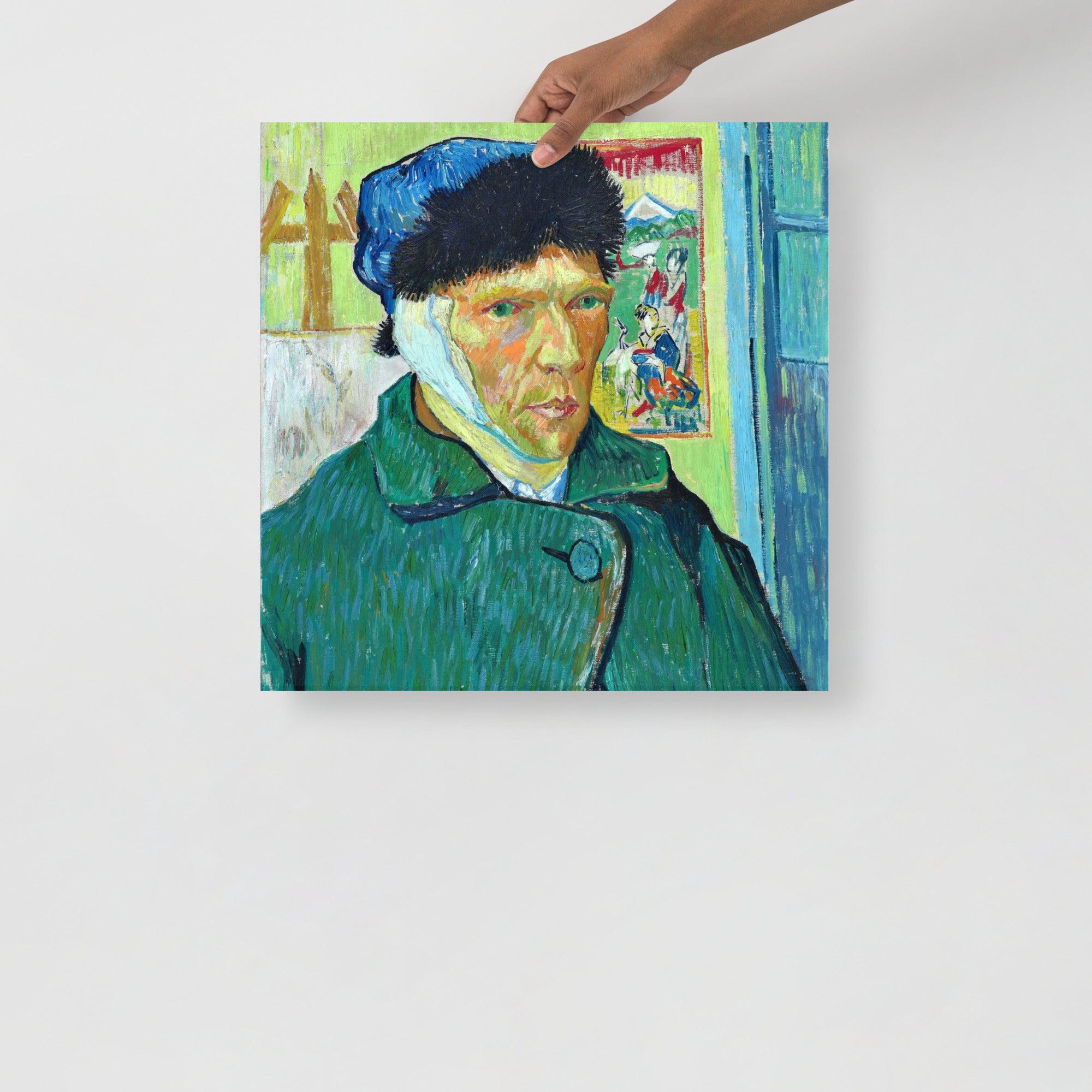 A Self Portrait With Bandaged Ear by Vincent Van Gogh poster on a plain backdrop in size 18x18”.