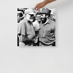 An Ernest Hemingway with Fidel Castro poster on a plain backdrop in size 18x18”.