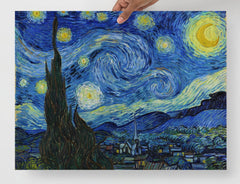A The Starry Night by Vincent van Gogh poster on a plain backdrop in size 18x24”.