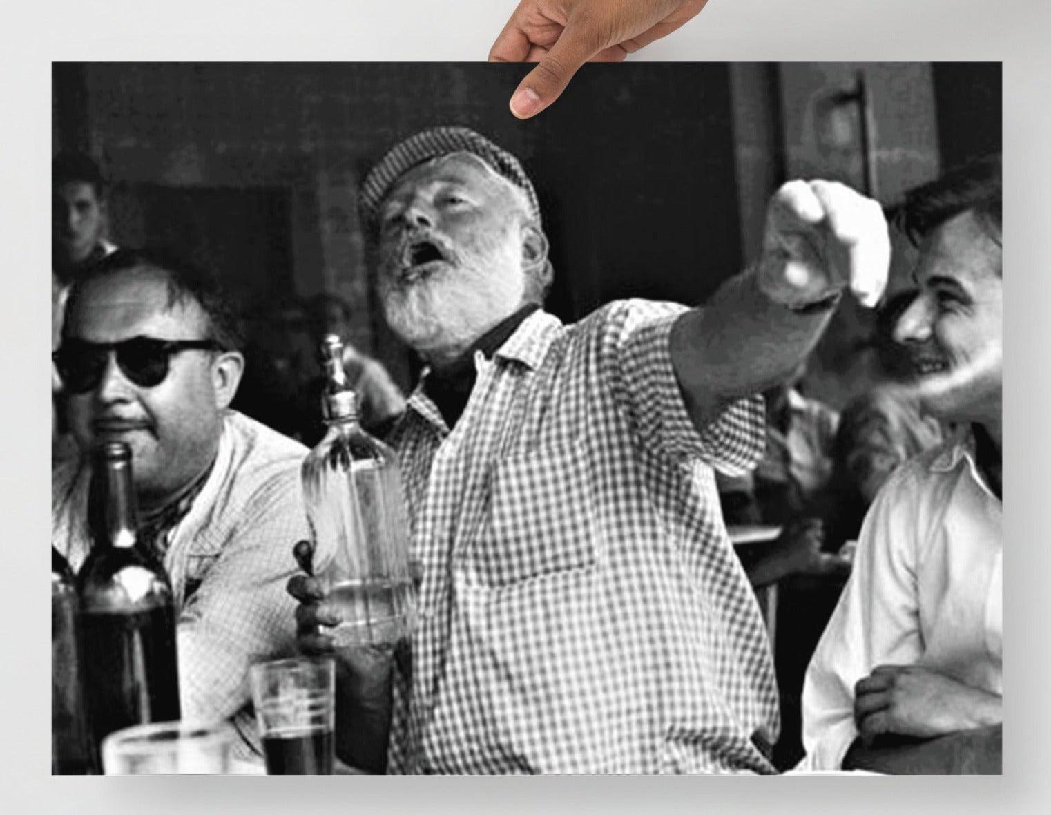 An Ernest Hemingway at a Bar  poster on a plain backdrop in size 18x24”.