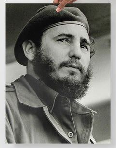 A Fidel Castro poster on a plain backdrop in size 18x24”.