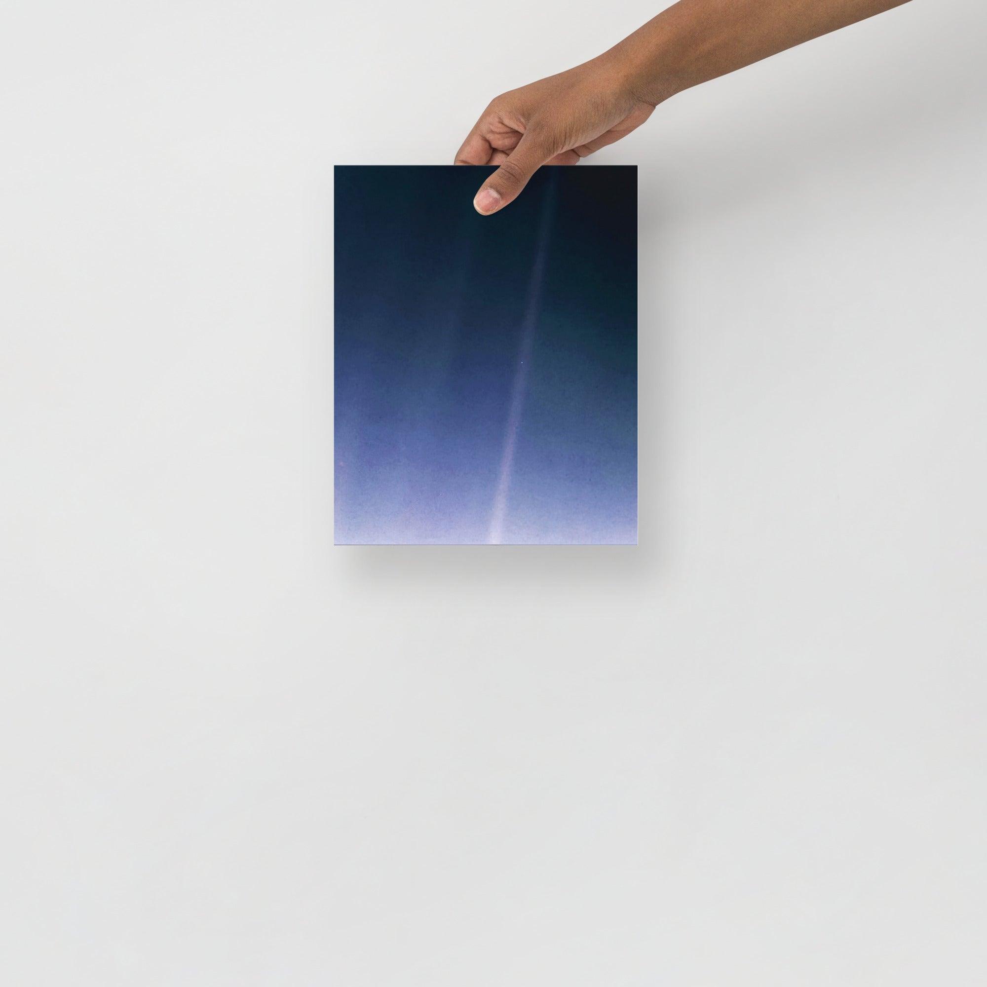 A Pale Blue Dot poster on a plain backdrop in size 8x10”.