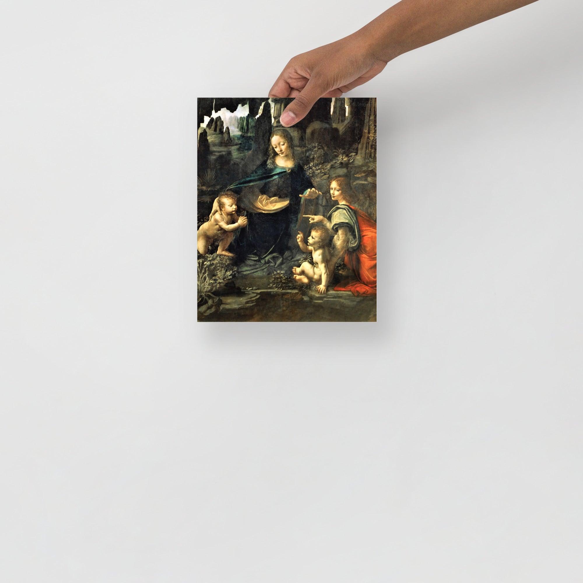 A Virgin of the Rocks by Leonardo Da Vinci  poster on a plain backdrop in size 8x10”.