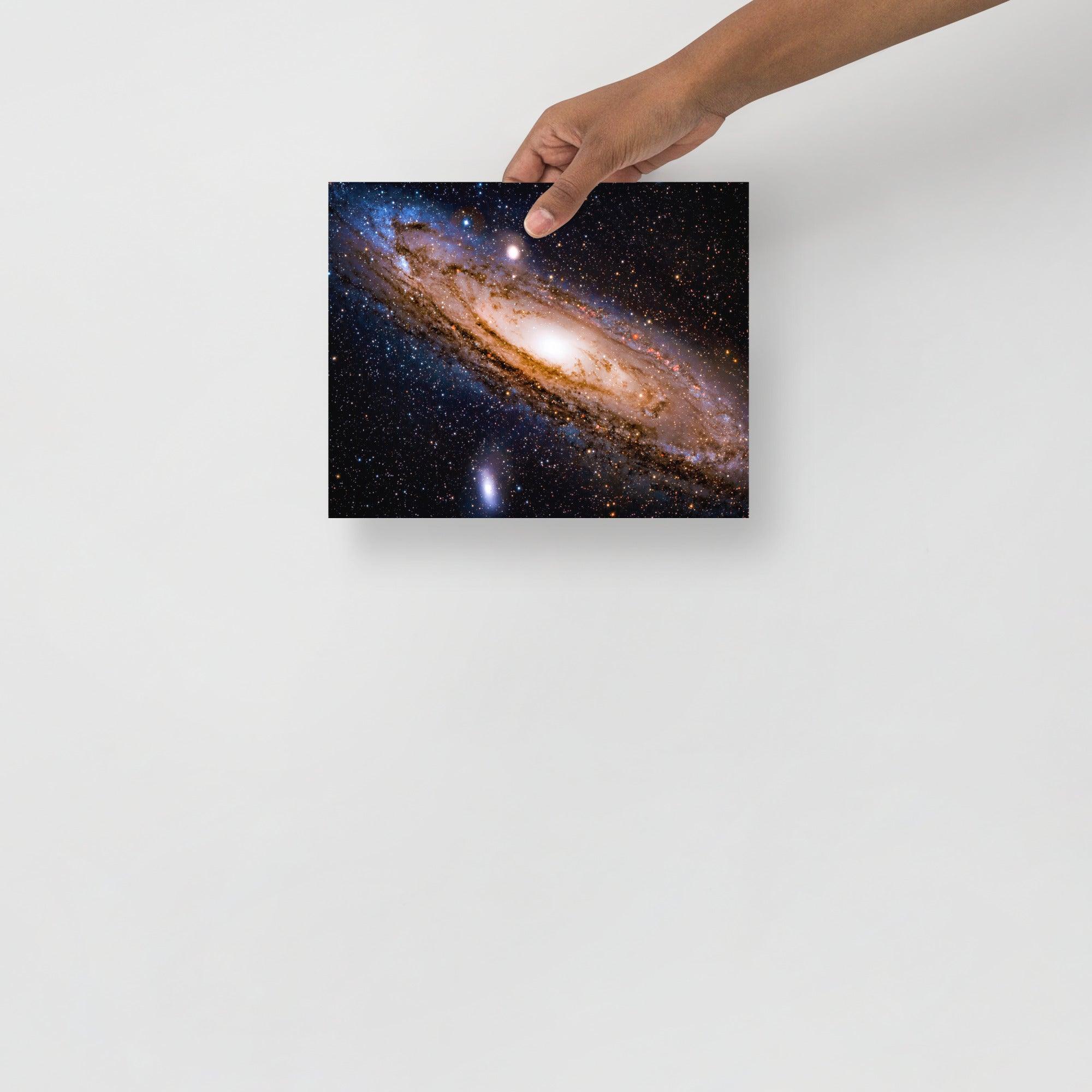 An Andromeda Galaxy poster on a plain backdrop in size 8x10”.