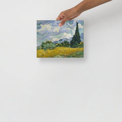 A Wheat Field with Cypresses by Vincent van Gogh poster on a plain backdrop in size 8x10”.