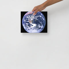 The Blue Marble poster on a plain backdrop in size 8x10”.